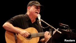 FILE - Cuban musician Silvio Rodriguez performs during a concert in Havana, September 2010.