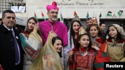 The Latin Patriarch of Jerusalem Pierbattista Pizzaballa poses for a photo during Christmas celebrations, in the West Bank city of Bethlehem, Dec. 24, 2017.
