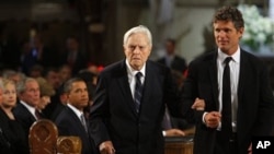 R. Sargent Shriver (L) is escorted to his seat in the church by his son Anthony Kennedy Shriver before funeral services for U.S. Sen. Edward Kennedy (File 2009)