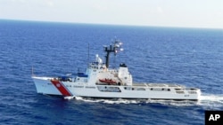 FILE - This undated handout photo provided by the U.S. Coast Guard shows US Coast Guard Cutter Vigilant. The U.S. Coast Guard has suspended the search for a group of Cuban migrants reported missing from a makeshift vessel that capsized off the Florida Keys.