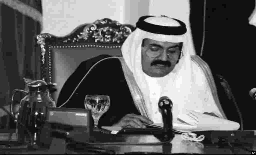 The former defence minister and Crown Prince of Qatar Prince Hamad Bin Khalifa al-Thani makes a speech on state-run radio, that he has taken control of the oil-rich Gulf emirate by ousting his father, Sheik Khalifa Bin Hamid al-Thani, while he was out of the country, in Doha, Qatar, June 27, 1995.