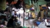 At the Hanoi market, many consumers are more interested in quality than politics, Vietnam. (M. Brown/VOA) 