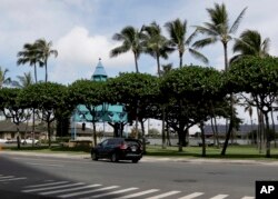 Uber driver Joshua Oh drives in Honolulu on Wednesday, June 6, 2018. Honolulu's city council is scheduled to vote on a bill that won't allow rideshare services to impose "surge pricing" if the fee is higher than the city max.