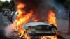Nouveaux heurts en marge du G20, voitures de police incendiées 
