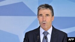 NATO chief Anders Fogh Rasmussen speaks to the press on June 26, 2012 at the NATO Headquarters in Brussels.