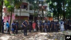 Bangladeshi policemen arrive near the scene of a blast in Kishoreganj, about 90 kilometers (60 miles) north of the capital of Dhaka, Bangladesh, July 7, 2016.