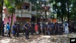 Bangladeshi policemen arrive near the scene of a blast in Kishoreganj, about 90 kilometers (60 miles) north of the capital of Dhaka, Bangladesh, July 7, 2016. 