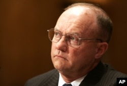 FILE - Lawrence Wilkerson, former chief of staff to Secretary of State Colin Powell, testifies on Capitol Hill, June 26, 2006.