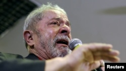 Brazil's former President Luiz Inacio Lula da Silva cries as he talks to the journalists during a news conference in Sao Paulo, Brazil, Sept. 15, 2016.