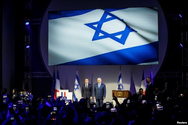 French President Emmanuel Macron and Israeli Prime Minister Benjamin Netanyahu attend the opening ceremony of the France-Israel season event in Paris, France, June 5, 2018.