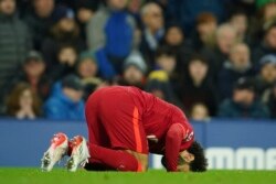 Dan wasan Liverpool Mohamed Salah na murnar zura kwallo ta biyu a wasan da kungiyarsa ta buga a gasar Premier tsakanin Everton da Liverpool a filin wasa na Goodison Park dake birnin Liverpool na kasar Ingila, Laraba 1 ga Disamba, 2021.