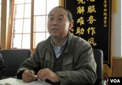 丹东市外经贸局官员黄宪民