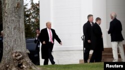 U.S. President-elect Donald Trump walks to the Lamington Presbyterian Church to attend Sunday services in Bedminster, New Jersey, Nov. 20, 2016. 