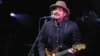Jeff Tweedy, leader of rock band Wilco, sings at a performance at Wolf Trap Park for the Performing Arts outside Washington where his band is supporting HeadCount, a non-profit, non-partisan organization registering people for upcoming elections, August 2