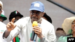People's Democratic Party (PDP) governorship aspirant Charles Airhiavbere speaks during a political rally at Sabongida Ora in Edo State June 13, 2012. 