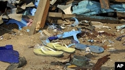 Shattered remnants are seen at the site of a bomb blast at a bar in the Nigerian northeastern city of Maiduguri