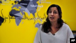 Lynn Maalouf, deputy director of research at Amnesty International Middle East and North Africa, speaks during an interview in Beirut, Lebanon, Feb. 6, 2017. Amnesty International says Syrian authorities killed at least 13,000 people in mass hangings at a prison north of Damascus. 