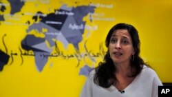 Lynn Maalouf, deputy director of research at Amnesty International Middle East and North Africa, speaks during an interview with The Associated Press in Beirut, Lebanon, Feb. 6, 2017.