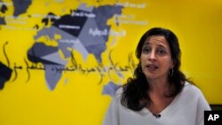 Lynn Maalouf, deputy director of research at Amnesty International Middle East and North Africa, speaks during an interview in Beirut, Lebanon, Feb. 6, 2017. Amnesty International says Syrian authorities killed at least 13,000 people in mass hangings at a prison north of Damascus. 