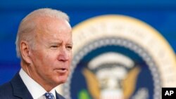 FILE - President Joe Biden speaks in the South Court Auditorium on the White House complex in Washington, Nov. 22, 2021.