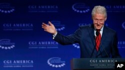 FILE - Former president Bill Clinton speaks at a gathering of the Clinton Global Initiative America, which is a part of The Clinton Foundation, in Denver, Colorado, June 10, 2015.