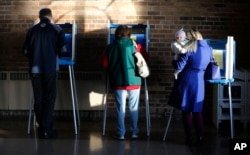Wisconsin voters cast their ballots in the state's primary at the South Shore Park Pavilion, in Milwaukee, April 5, 2016.