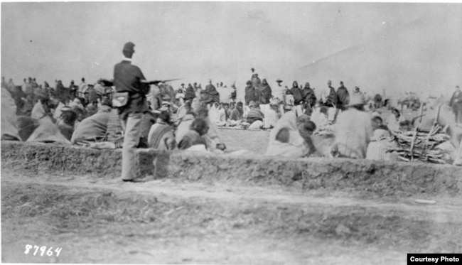 Navajos under guard at Fort Sumner, Bosque Redondo, ca. 1864. Courtesy: National Archives, Washington, DC