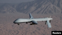 FILE - An undated handout photo courtesy of the U.S. Air Force shows an unmanned MQ-1 Predator drone.