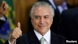 Penjabat Presiden Brazil Michel Temer di Istana Planalto, Brasilia (12/5). (Reuters/Ueslei Marcelino)