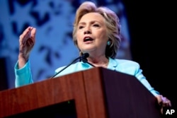 Democratic presidential candidate Hillary Clinton speaks at the 2016 National Association of Black Journalists' and National Association of Hispanic Journalists' Hall of Fame Luncheon at Marriott Wardman Park in Washington, Aug. 5, 2016.