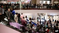 Shoppers throng Brea Mall during Black Friday shopping in Brea, California.