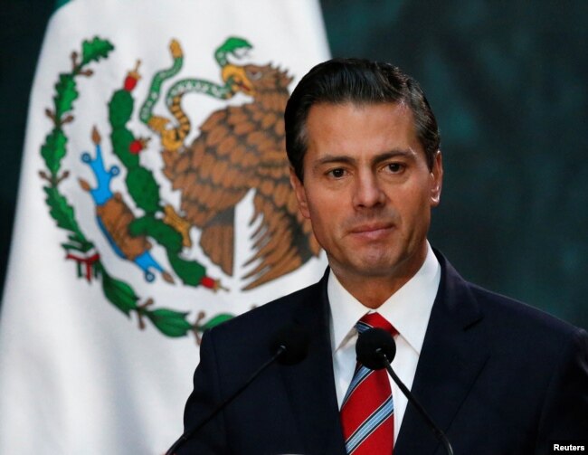 FILE - Mexico's President Enrique Pena Nieto gives a speech at the National Palace in Mexico City, Nov. 21 2017.
