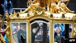 Dutch King Willem-Alexander and Queen Maxima depart in the Golden Carriage from the Ridderzaal (Knights' Hall) in the Hague, the Netherlands, on September 17, 2013, on Prinsjesdag (Prince's Day), the traditional opening of the Dutch parliamentary year. Th