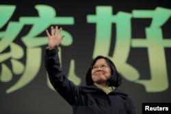 FILE - Democratic Progressive Party (DPP) Chairperson and presidential candidate Tsai Ing-wen waves to her supporters after her election victory at party headquarters in Taipei, Taiwan, Jan. 16, 2016.