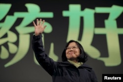 ILE - Tsai Ing-wen waves to her supporters after her election victory at party headquarters in Taipei, Taiwan, Jan. 16, 2016.