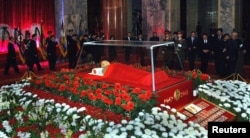 FILE - The body of North Korean leader Kim Jong-il lies in state at the Kumsusan Memorial Palace in Pyongyang in this picture released by the North's official KCNA news agency early Dec. 21, 2011.