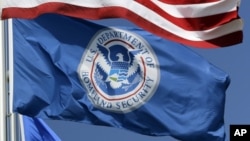 FILE - The Department of Homeland Security flag.