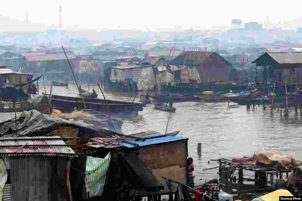 The government calls this sprawling village in the lagoon a shantytown, but residents say Makoko is not just a place, it is a way of life in Makoko, Lagos, July 5, 2013. Photo: VOA/H. Murdock