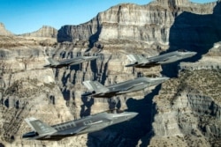 U.S. -- U.S. Air Force F-35 Lightning II fighter jets perform aerial maneuvers as part of a combat power exercise over Utah Test and Training Range, Utah, November 19, 2018