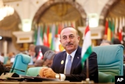 Turkey's Foreign Minister Mevlut Cavusoglu attends Islamic Summit of the Organization of Islamic Cooperation in Mecca, Saudi Arabia, June 1, 2019. Muslim leaders from 57 nations gathered in Islam's holiest city to discuss critical issues, including tensions in the Persian Gulf, Palestinian statehood, Rohingya refugees and the growing threat of Islamophobia.