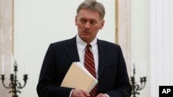 FILE - Russian President Vladimir Putin's spokesman Dmitry Peskov is seen at the Kremlin in Moscow, Russia, March 27, 2017.