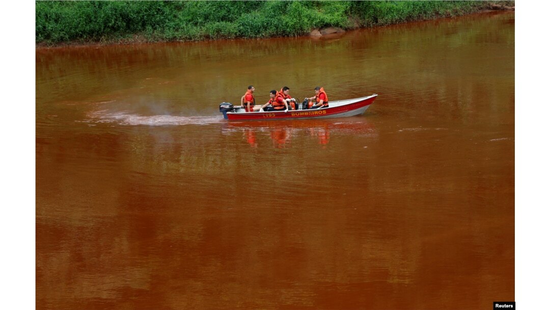 Members of a rescue team use a boat on the Paraopeba River as they search for victims of a collapsed tailings dam owned by Brazilian mining company Vale SA, in Brumadinho, Brazil, Feb. 4, 2019.