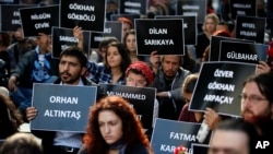 Students of Ankara University hold the placards with the names of those killed in the Oct. 10 deadly explosions in Ankara, during a sit-in protest in Turkey's capital city, Oct. 13, 2015.