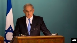 Perdana Menteri Israel Benjamin Netanyahu dalam konferensi pers di kantornya di Yerusalem (20/10). (AP/Sebastian Scheiner)