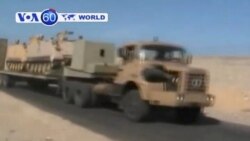 Egyptian troops move into the town of Al-Arish after a series of attacks on security forces