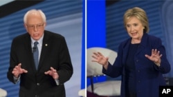 ຜູ້ສະໝັກແຂ່ງຂັນເປັນປະທານາທິບໍດີ ສັງ​ກັດ​ພັກ​ເດ​ໂມ​ແຄ​ຣັດ ສະມາຊິກສະພາສູງ ທ່ານ Bernie Sanders (ຊ້າຍ) ແລະ ອະດີດລັດຖະມົນຕີ ຕ່າງປະເທດ ທ່ານນາງ Hillary Clinton ເຂົ້າຮ່ວມກອງປະຊຸມຕອບຄຳຖາມຜູ້ຂ້ອງໃຈ ໃນເມືອງ Derry ຂອງລັດ New Hampshire, ວັນທີ 3 ກຸມພາ 2016.