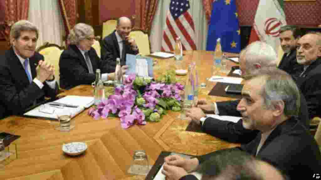 Officials from the P5+1 and the European Union wait for negotiations to begin at the Beau Rivage Palace Hotel in Lausanne, Switzerland March 30, 2015.