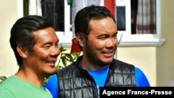 Mountaineer brothers Tashi Lakpa Sherpa, left, and Chhang Dawa Sherpa pose for a picture Jan. 21, 2022, upon their arrival in Kathmandu after summiting Antarctica's highest peak, Mount Vinson, and skiing to the South Pole.