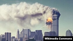 FILE - A fireball erupts from the south tower of the World Trade Center as the second of two hijacked airlines crash into the building, Sept. 11, 2001.