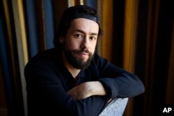 FILE - Ramy Youssef, star of the Hulu series "Ramy," is pictured during the 2019 Winter Television Critics Association Press Tour, Feb. 11, 2019, in Pasadena, Calif.